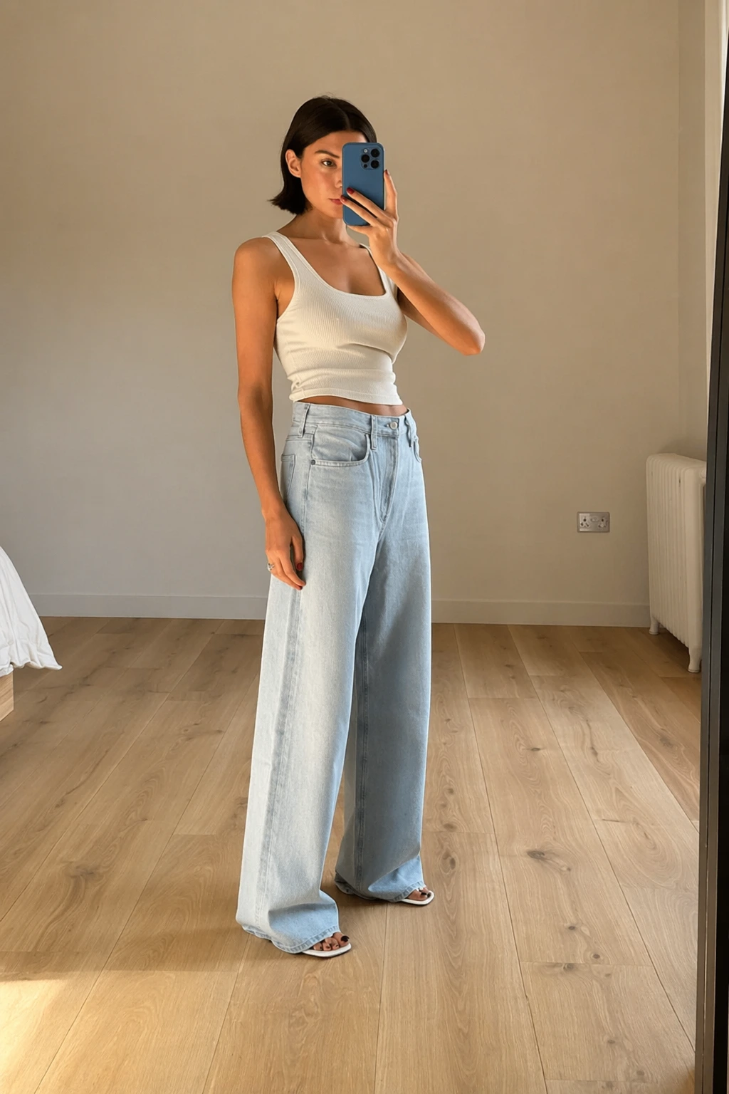 White Tank Top + Light Wash Wide-Leg Jeans + White Slide Sandals