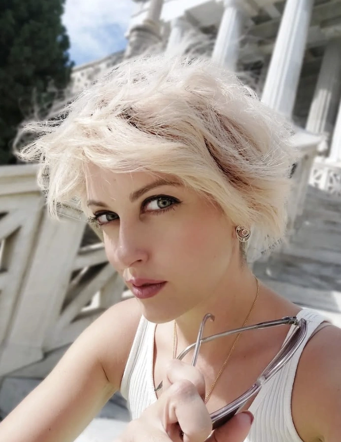 Wispy Platinum Blonde Longer Pixie Haircut with Root Lift