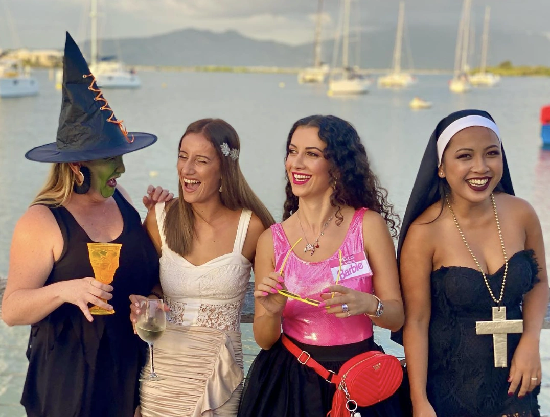 Witch Hat + Green Face Paint + White Dress + Pink Barbie Top + Black Dress + Statement Cross Necklace