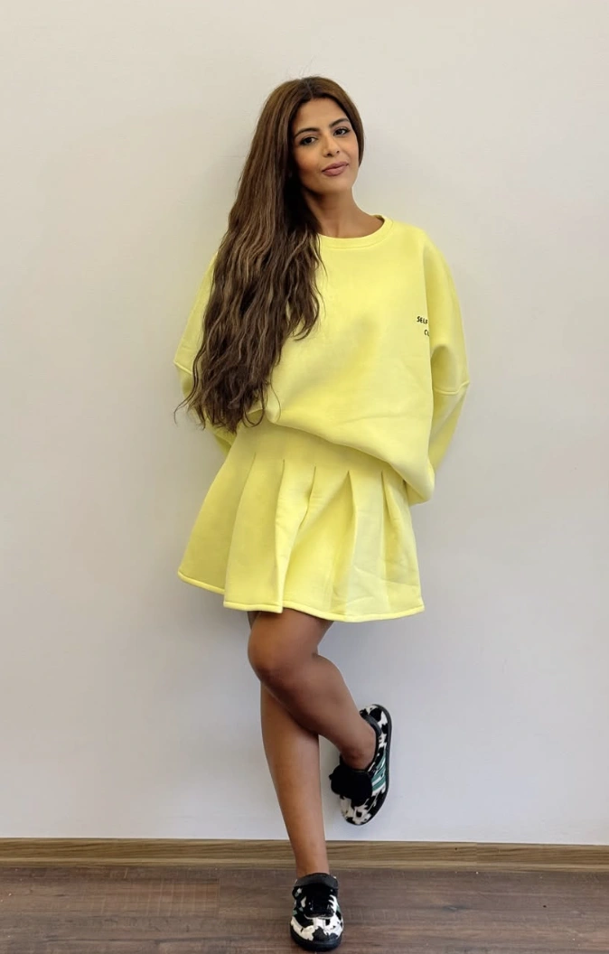 Yellow Sweatshirt + Yellow Mini Skirt + Patterned Sneakers
