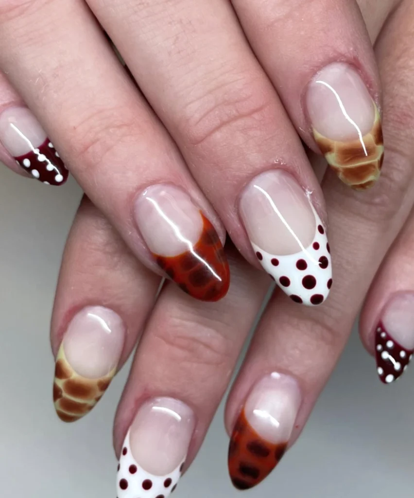 A glossy finish with brown and white tips, dotted patterns