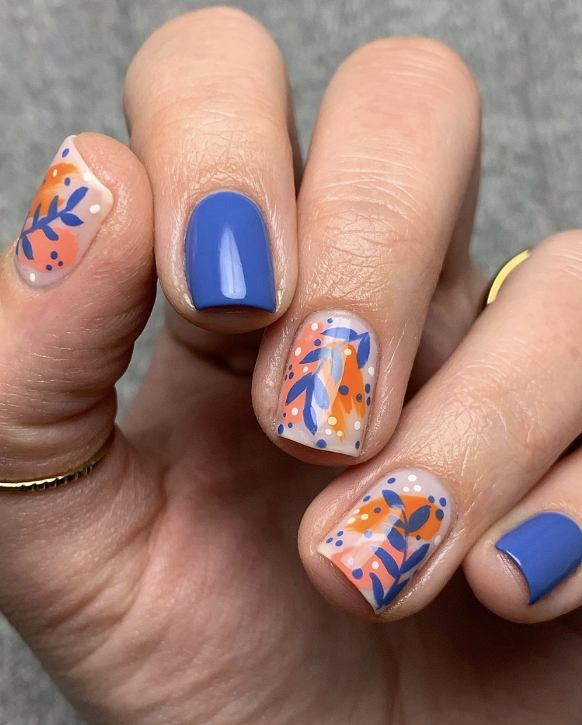 Abstract Floral Nail Art with Cobalt Accents