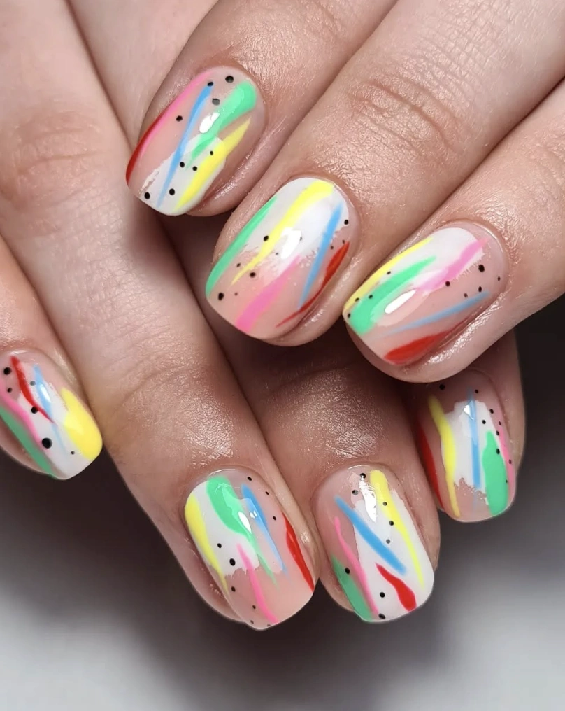 Abstract Pastel Strokes with Black Dot Accents on Short Nails