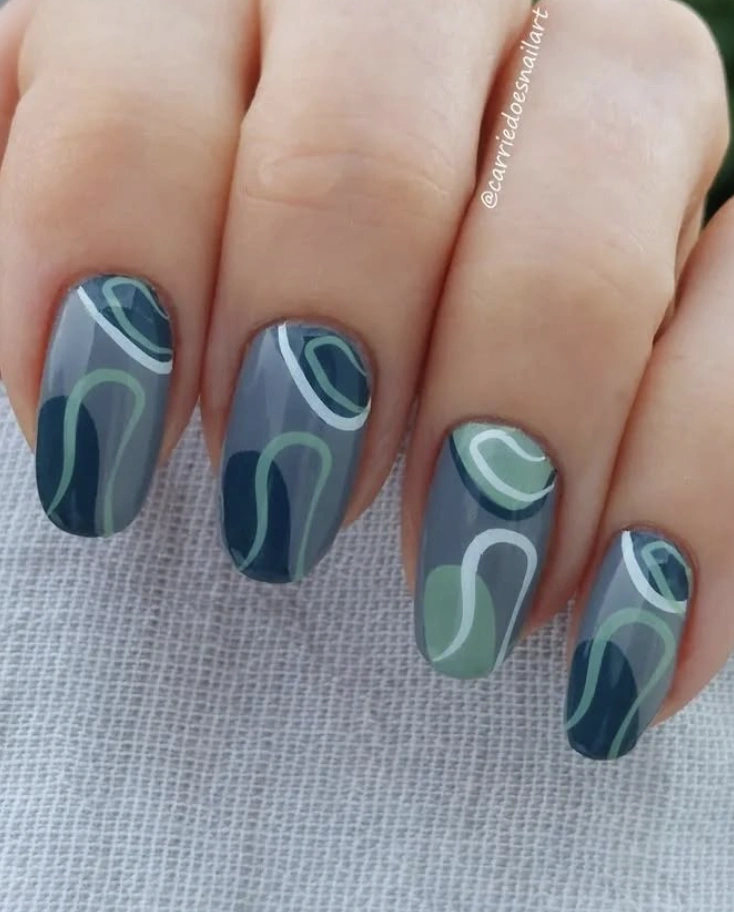 Abstract Swirl Nail Design in Muted Blues and Greens
