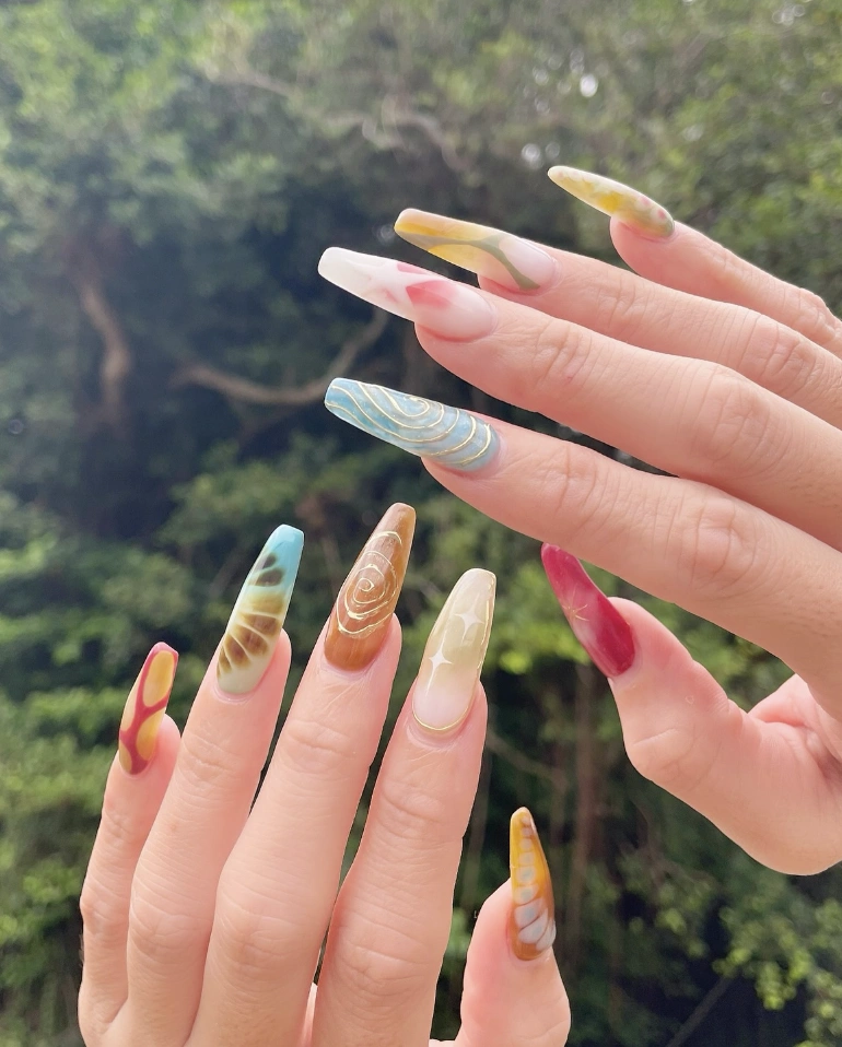 Abstract Swirls on Coffin-Shaped Earthy Nails