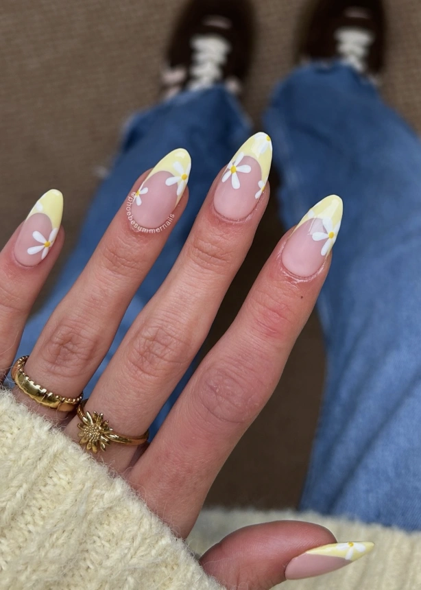 Almond French Tip Nails with Daisy Accent
