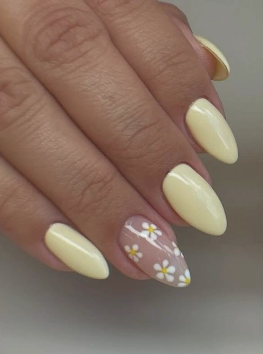 Almond Nails in Pastel Yellow with Daisy Accent