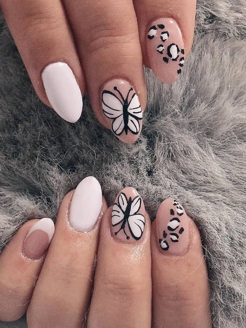 Almond Nails with Butterfly and Leopard Print Designs