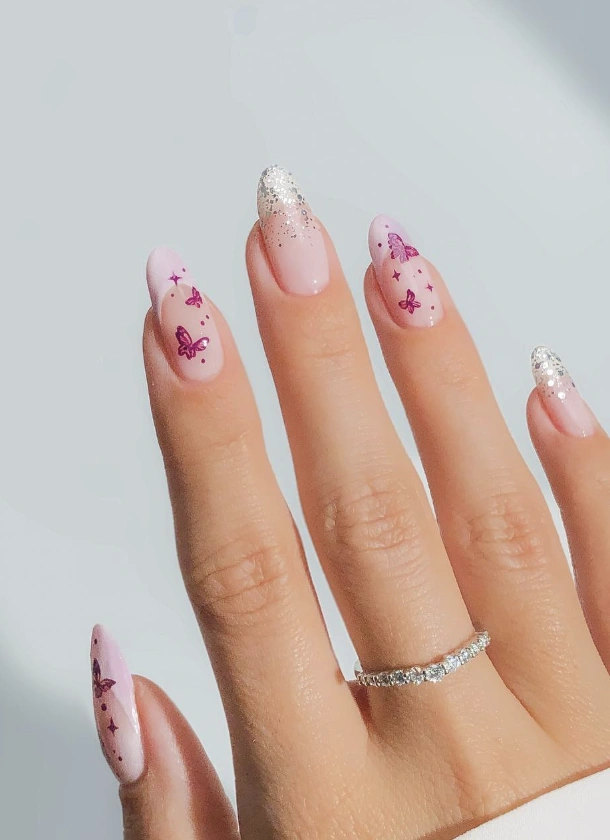 Almond Nails with Delicate Butterfly and Glitter Accents