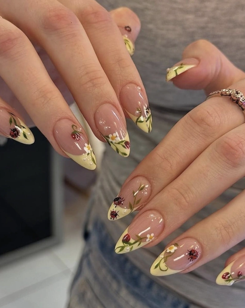 Almond Nails with Ladybug and Floral Yellow Nail Art
