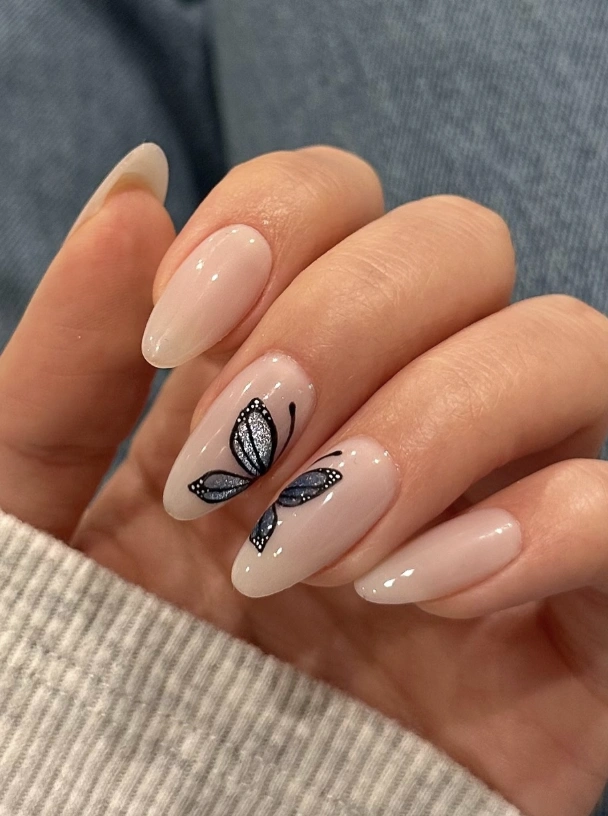 Almond Nude Nails with Glitter Butterfly Detail