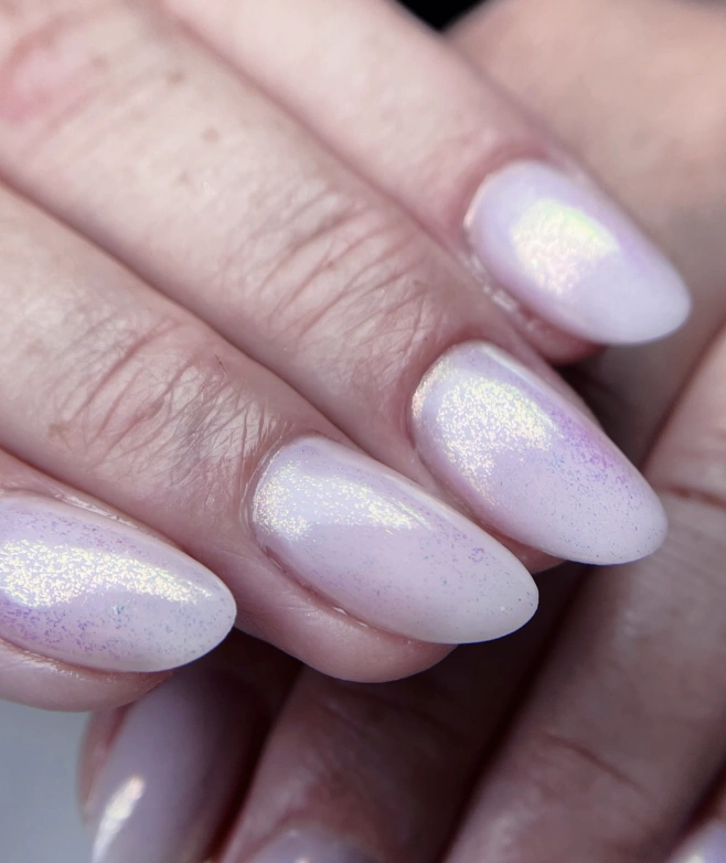 Almond-Shaped Milky Nails with Iridescent Shimmer and Subtle Lavender Hues