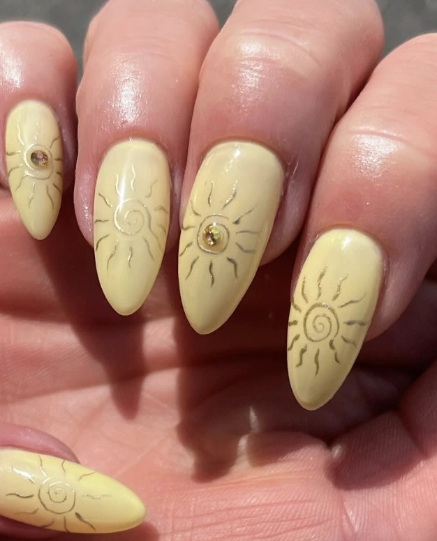 Almond-Shaped Summer Yellow Nails with Sunburst Design