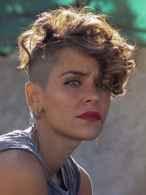 Asymmetrical Pixie Cut with Undercut and Honey Blonde Highlights