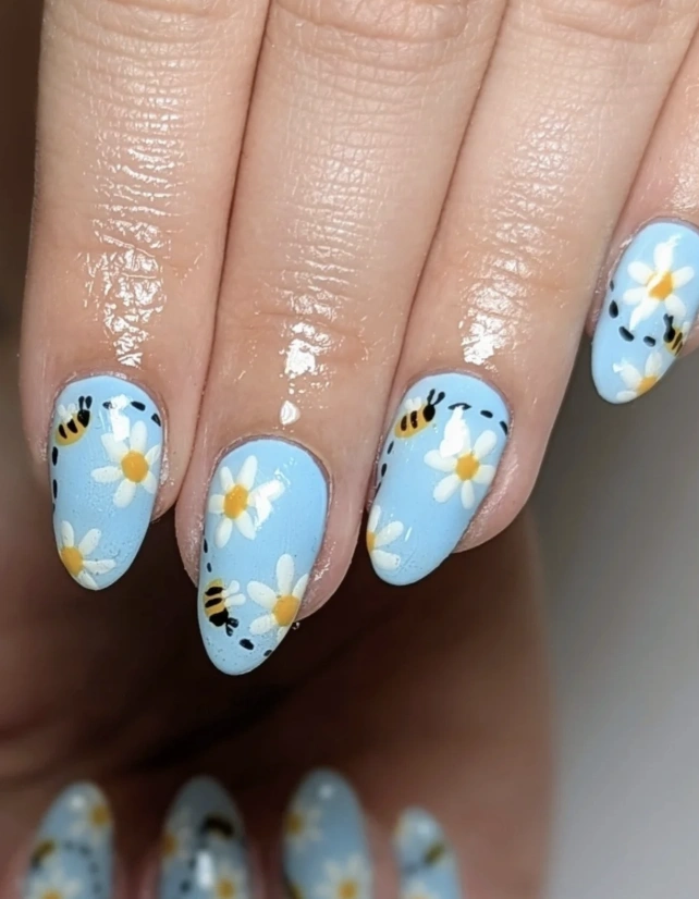 Baby Blue Almond Nails with Daisy and Bee Details