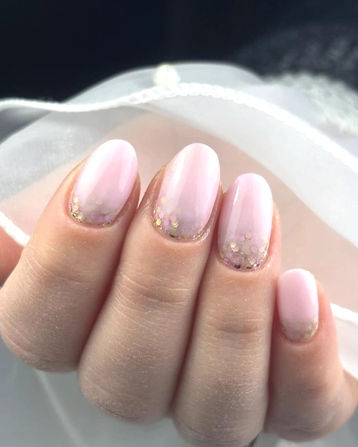 Baby Pink Oval Nails with Champagne Glitter Tips