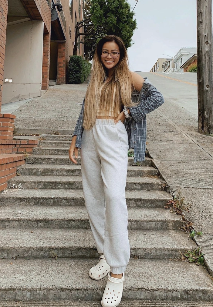 Beige Cropped Tank Top + Gray Sweatpants + Blue Plaid Overshirt + White Crocs Clogs