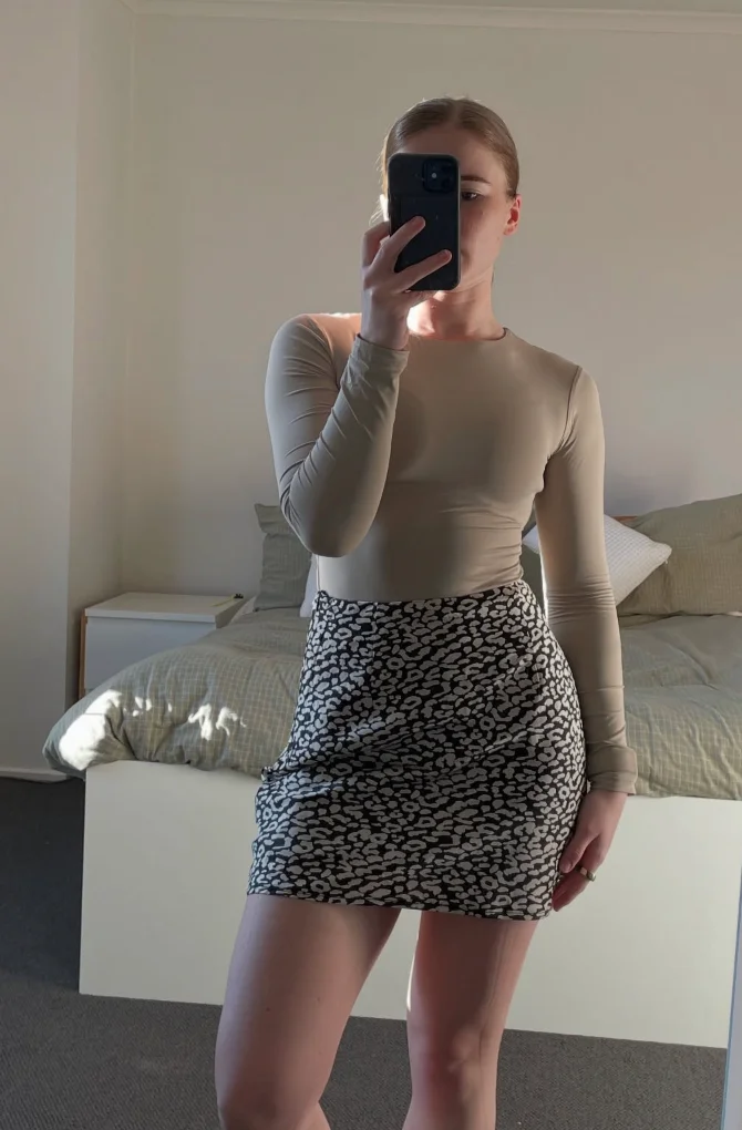 Beige Fitted Long Sleeve Top + Black White Printed Mini Skirt