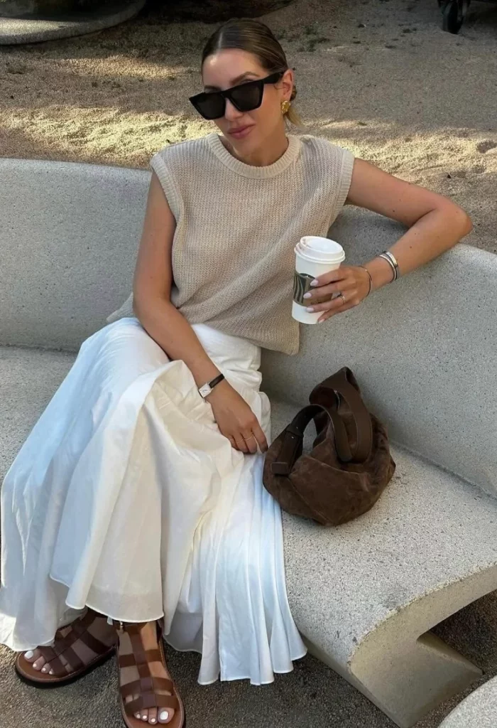 Beige Sleeveless Knit Vest + White Pleated Maxi Skirt + Brown Flat Sandals