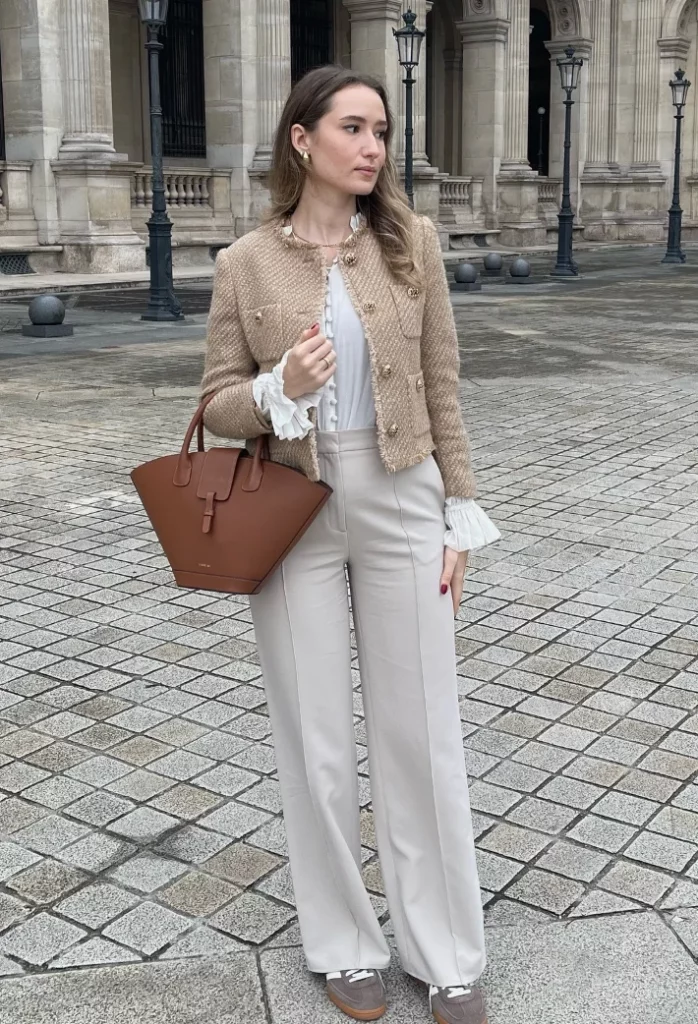 Beige Tweed Jacket + White Ruffled Blouse + Light Beige Wide-Leg Trousers + Gray White Sneakers