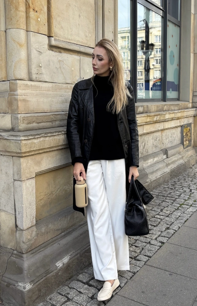 Black Leather Trench Coat + Black Turtleneck Sweater + White Wide-Leg Pants + Cream Loafers