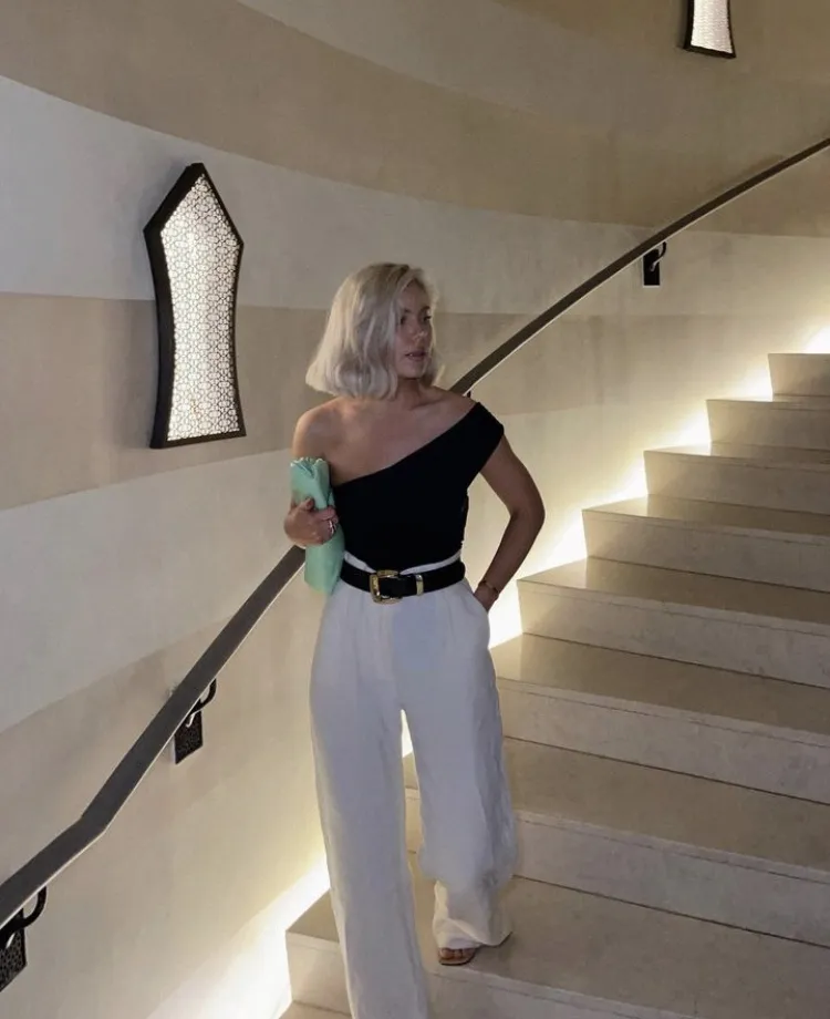 Black One-Shoulder Top + White Wide-Leg Pants + Black Belt + Strappy Sandals