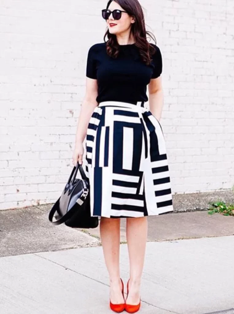 Black Short Sleeve Top + Black White Geometric Midi Skirt + Red Pointed Toe Heels