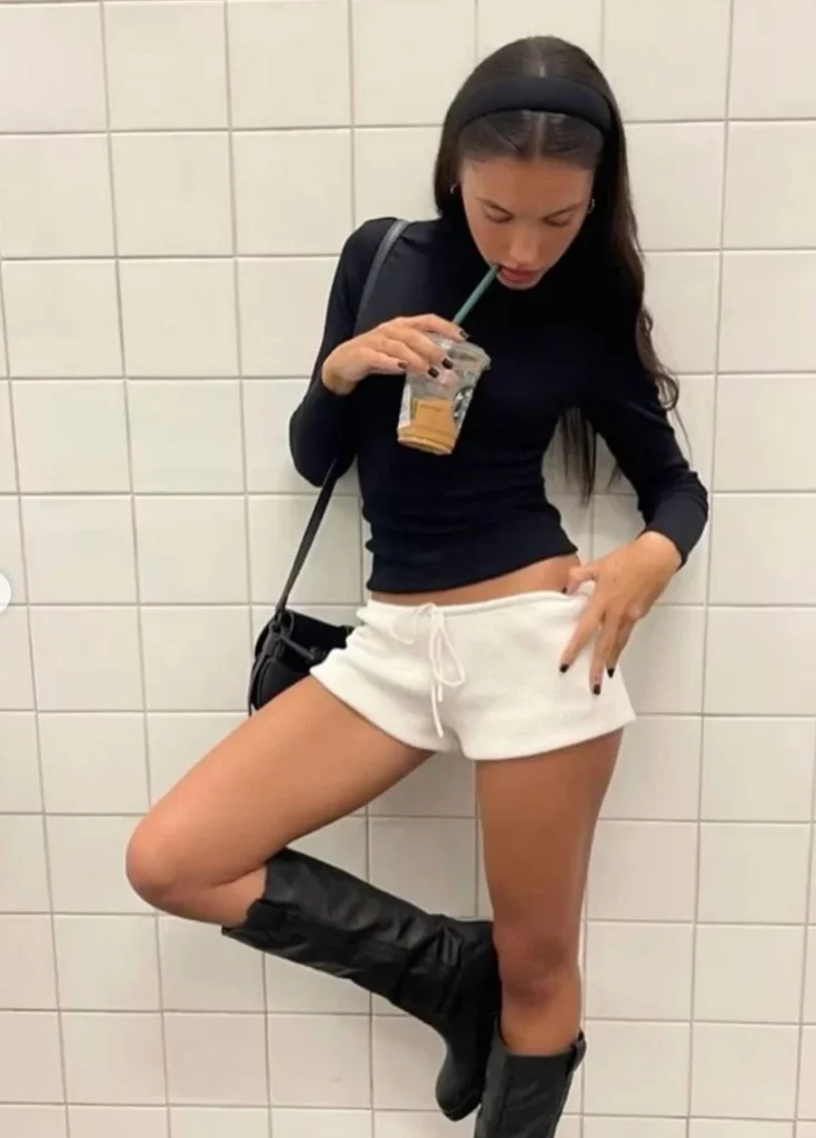 Black Turtleneck + White Sweat Shorts + Knee-high Boots