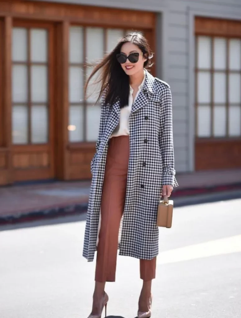 Black White Gingham Trench Coat + White Top + Brown Wide-Leg Trousers + Tan Pointed-Toe Heels