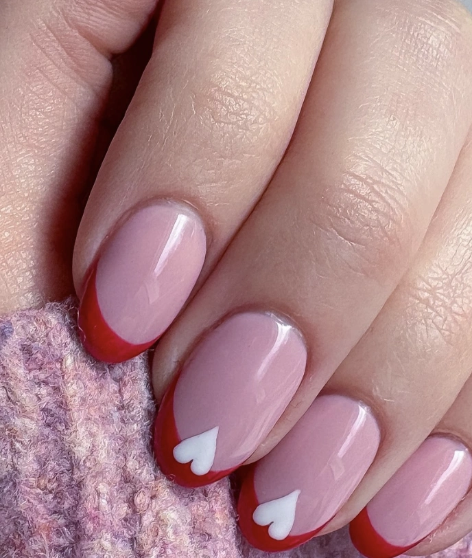 Blush Pink Nails with Red French Tips and Mini Hearts