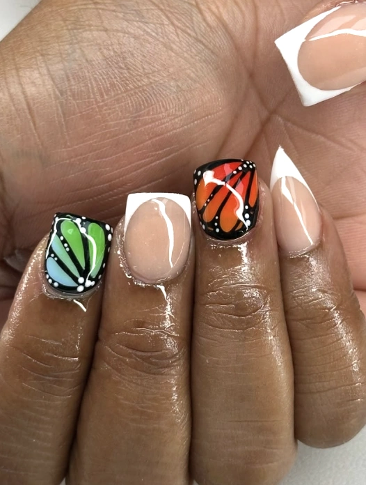 Bold Butterfly Accent Nails with Classic French Tips