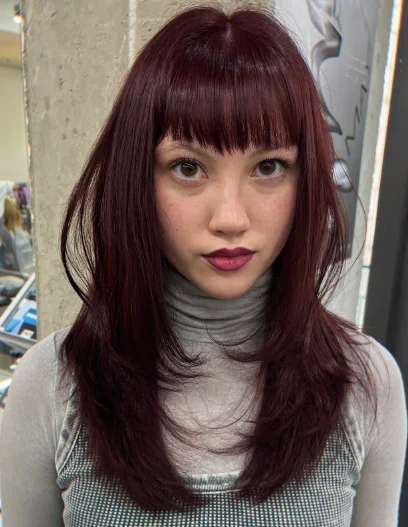Bold Layered Hair with Straight Bangs