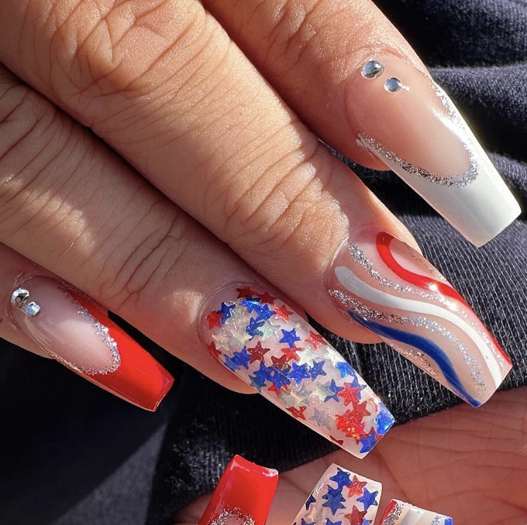 Bold Red and White Square Nails with Starry Glitter and Silver Swirls