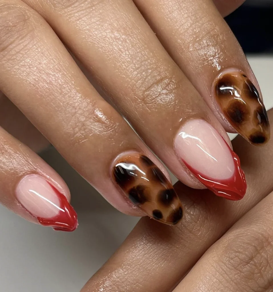 Bold Red Tips on Leopard Print Fall Almond Shaped Nails with Glossy Finish