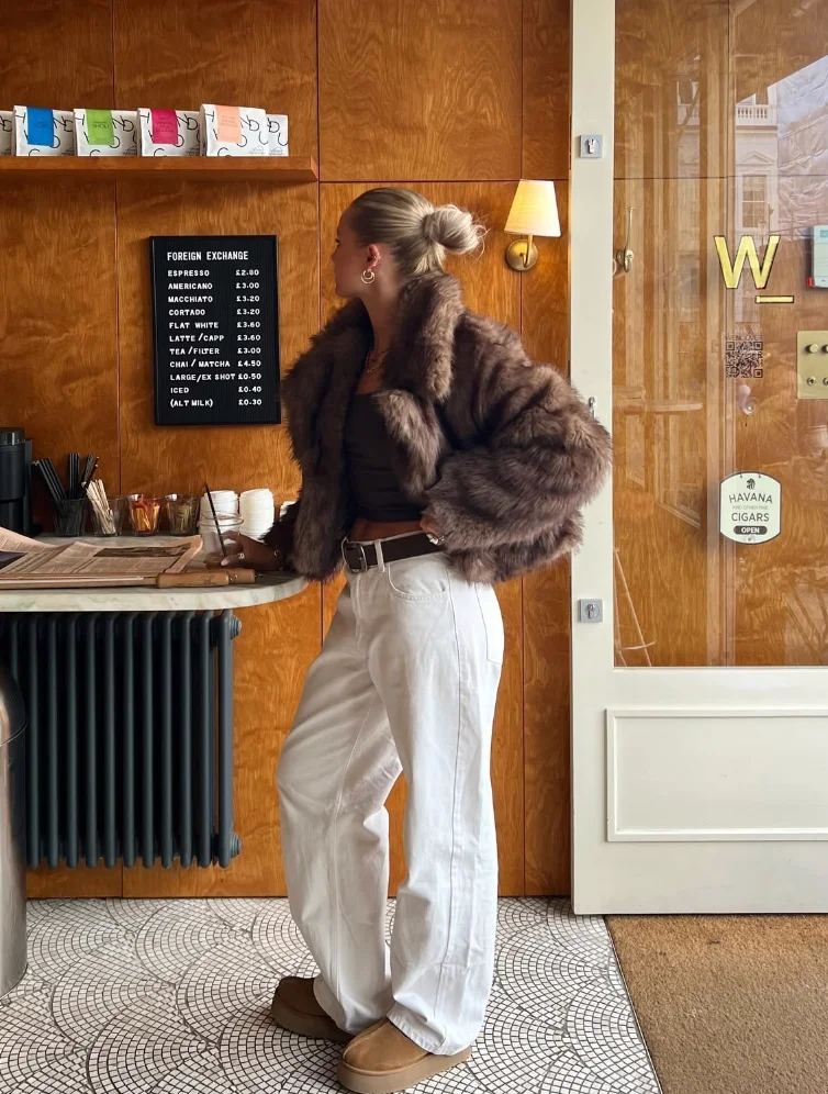 Brown Faux Fur Coat + Black Cropped Turtleneck Top + White Wide-Leg Trousers + Tan Suede Slippers