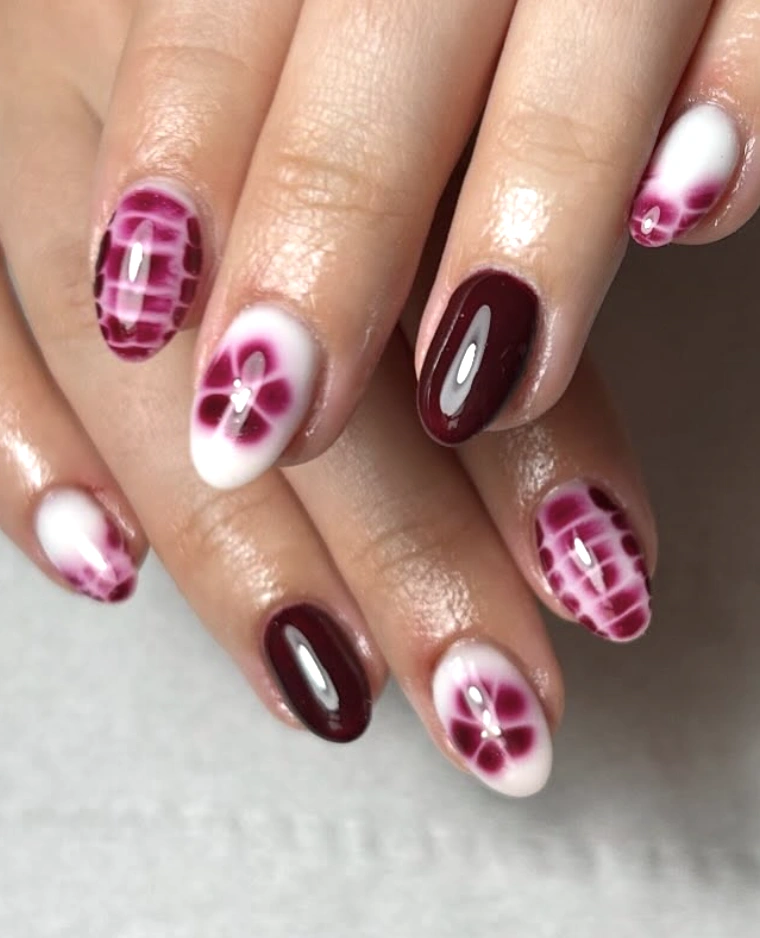 Burgundy and White Ombre Nails with Floral Art and Glossy Finish