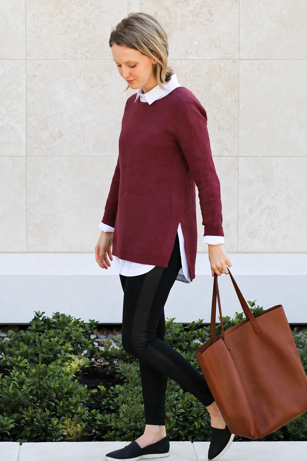 Burgundy Knit Sweater + White Button-Up Shirt + Black Leggings + Casual Slip-On Shoes