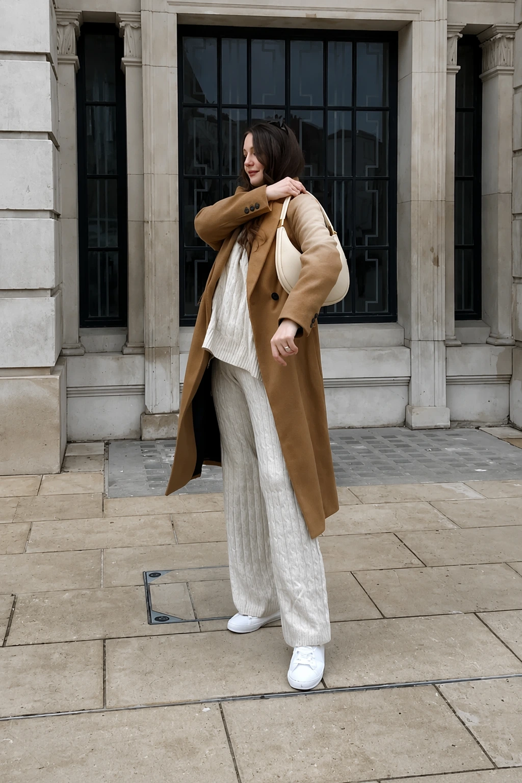 Camel Wool Coat + Cream Cable-Knit Sweater + Cream Knit Wide-Leg Pants + White Sneakers