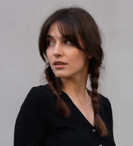 Center-Part Braids with Face-Framing Bangs for a Casual Street Look