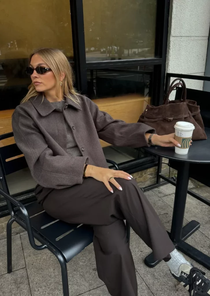 Charcoal Oversized Wool Coat + Dark Brown Wide-Leg Trousers + Black Athletic Sneakers