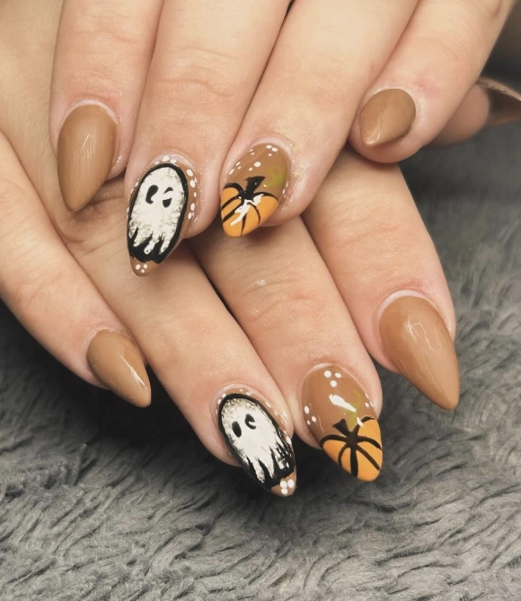 Charming Pumpkin and Ghost Almond Nails with Warm Brown Tones for Fall
