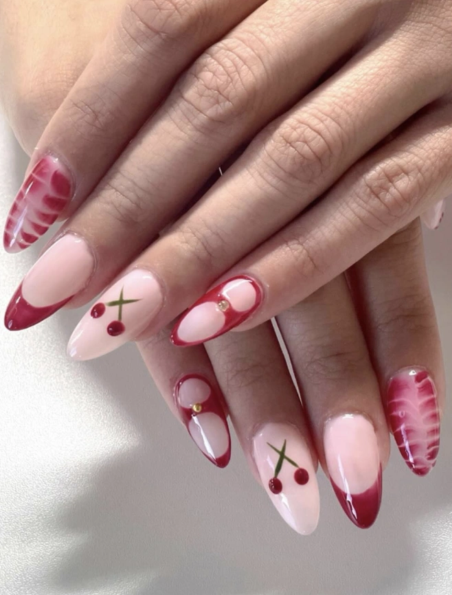Cherry Blossom Almond Nails with Deep Red Tips and Delicate Floral Accents