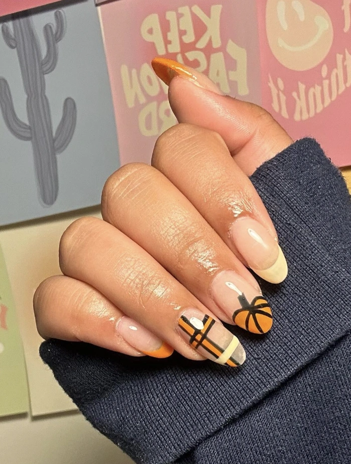 Chic Almond Fall Nails with Pumpkin Orange Tips and Whimsical Plaid Patterns