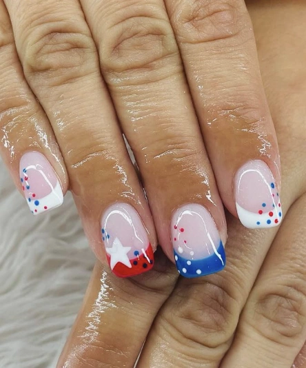 Chic French Tip Square Nails with Red, White, and Blue Accents and Star Motifs