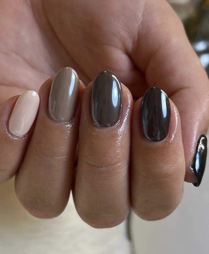 Chic Ombre Oval Chrome Nails in Warm Taupe, Deep Brown, and Elegant Black