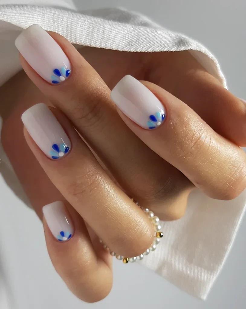 Chic Square Milky Pink Nails with Blue Floral Tips and Glossy Finish