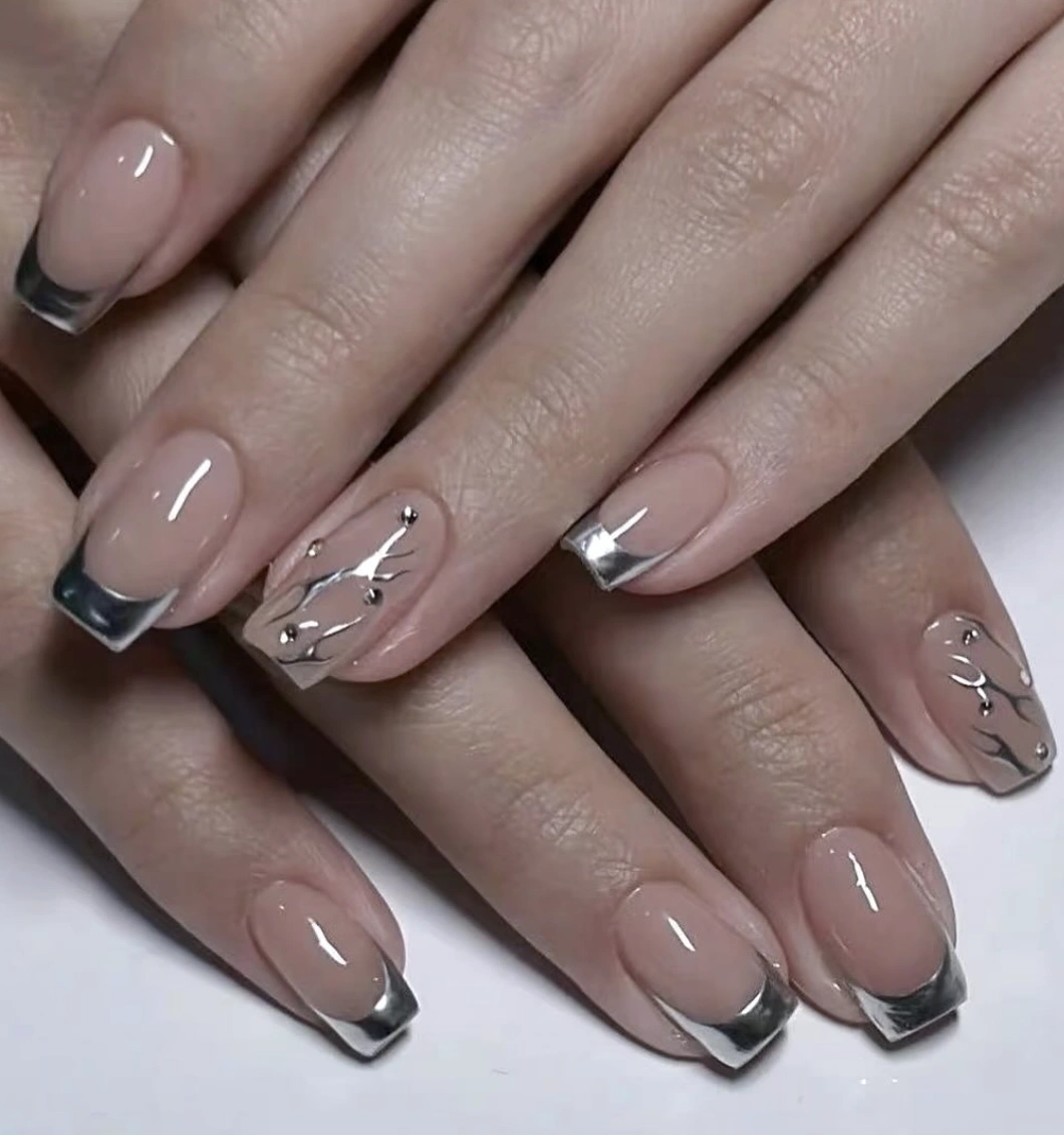 Chrome-Tipped French Manicure with Silver Accent Details