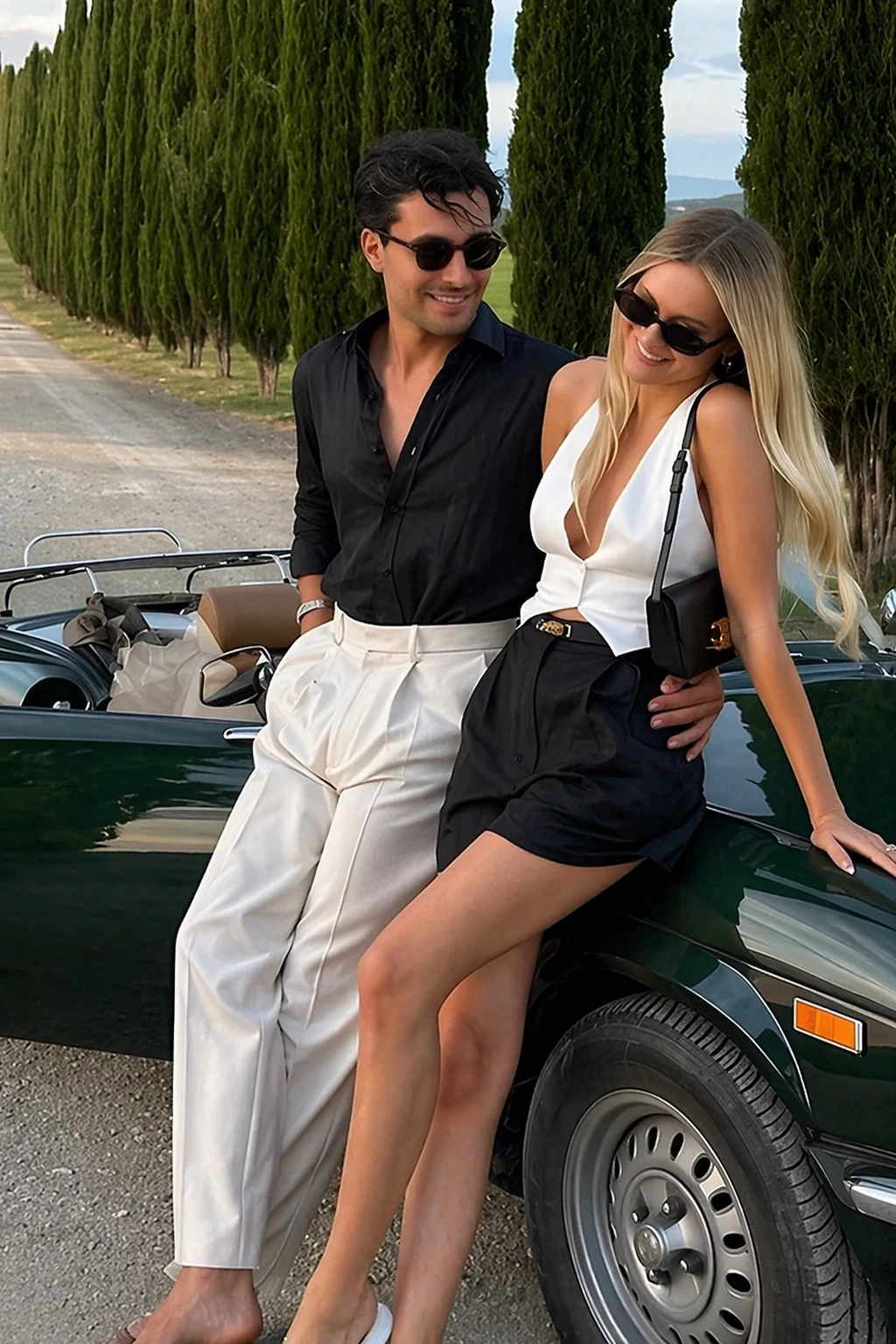 Classy Couple Aesthetic: Black Button-Up Shirt + White Plunge Bodysuit + High-Waisted Black Shorts + Cream Tailored Trousers