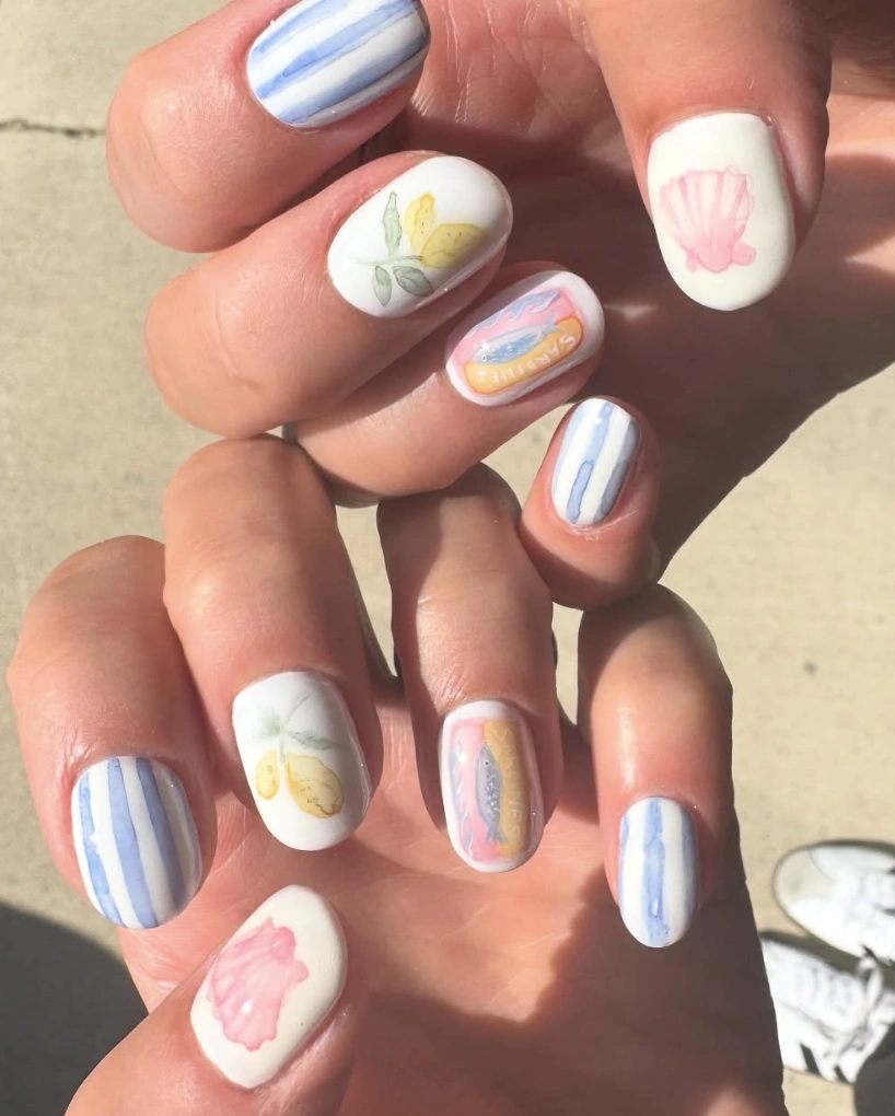 Coastal Charm: White Nails with Watercolor Motifs