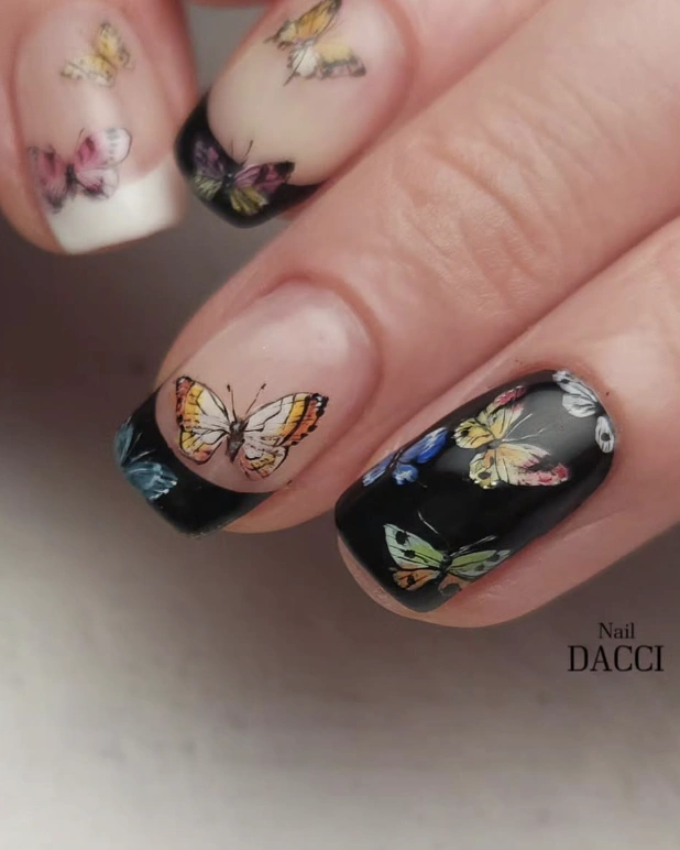 Contrasting Black French Manicure with Butterfly Decals